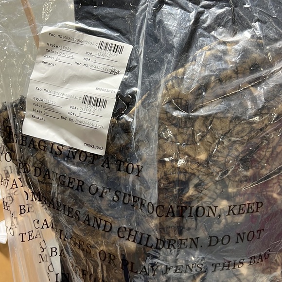 Stylish Jovani strapless. Color is Black/Vanilla. Size 6,8. - Picture 4 of 4